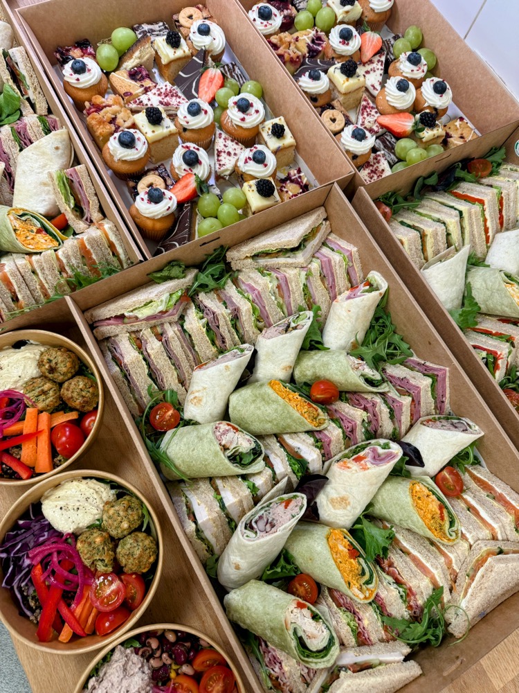 Freshly made baguette sandwiches with salad and cured meats